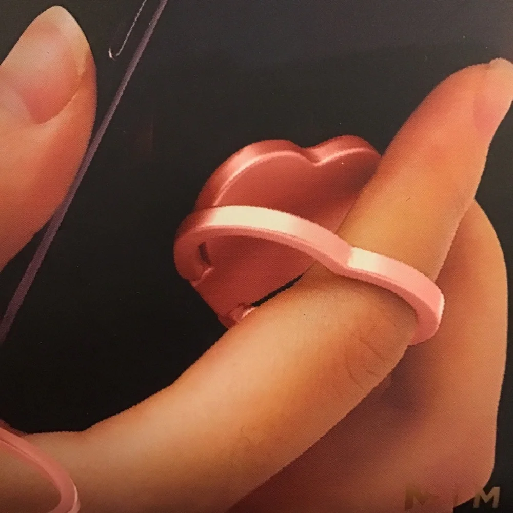MVMT ROSE GOLD HEART SHAPED PHONE RING HOLDER N…